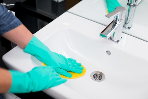 Wiping and scrubbing oven surfaces for a deep clean