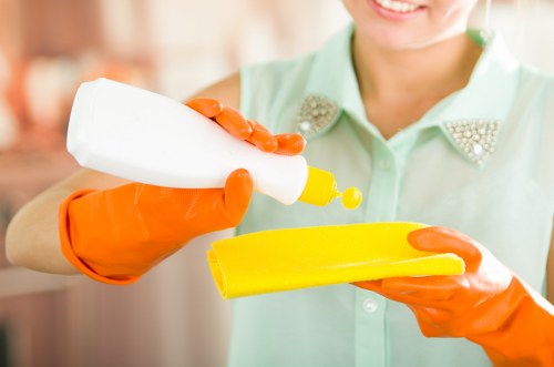 Spot cleaning a stain on a sofa cushion